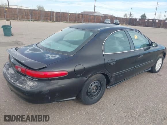 ✅ 1997 Mercury Sable GS • VIN: 1MELM50U5VA656308 • Lot: 41882560. Wystawiony na IAAI z przebiegiem 91 017 mil. Bezpłatny archiwum sprzedaży aukcyjnych z USA i szczegółowy raport historii pojazdu na DreamBid. Zdjęcie 4.