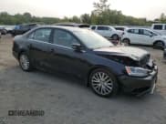 ✅ 2014 Volkswagen Jetta SEL • VIN: 3VWL17AJ0EM440764 • Lot: 67219565. Listed on Copart with 123,813 mi. Free auction sales archive from the USA and detailed vehicle history report at DreamBid. Image 4.