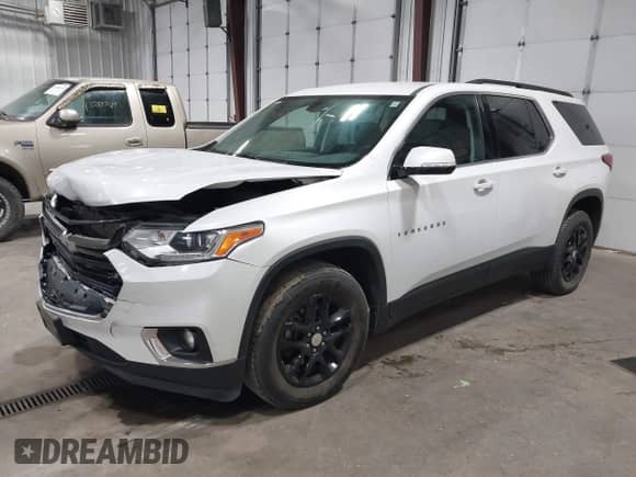 2019 Chevrolet Traverse LT Cloth z VIN 1GNEVGKW1KJ298306, wystawiony jako IAAI lot #43302460 z przebiegiem 76 785 mil mil oraz . Historia ofert i sprzedaży dostępna na DreamBid. Obrazek 2.