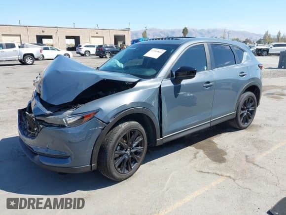 ✅ 2021 Mazda CX-5 Touring • VIN: JM3KFACM1M0330402 • Lot: 43305848. Listed on IAAI with 71,765 mi. Free auction sales archive from the USA and detailed vehicle history report at DreamBid. Image 16.
