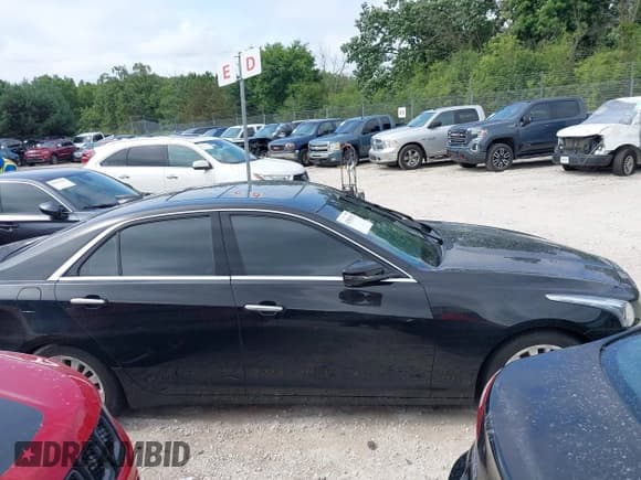 ✅ 2015 Cadillac CTS Luxury AWD • VIN: 1G6AX5SX5F0109217 • Lot: 42983192. Listed on IAAI with 54,841 mi. Free auction sales archive from the USA and detailed vehicle history report at DreamBid. Image 13.