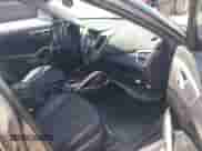 2012 Hyundai Veloster w/Black Int with VIN KMHTC6ADXCU061325, listed as a IAAI auction lot 42556398 with 122,954 mi miles and . Bid and sale history available at DreamBid. Image 5.