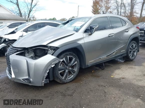 ✅ 2020 Lexus UX 250h • VIN: JTHX9JBH2L2020481 • Лот: 43616351. Опубликован ранее на IAAI с пробегом 64 490 миль. Бесплатный доступ к архиву аукционных продаж из США и подробный отчёт об истории автомобиля на DreamBid. Изображение 2.