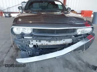 ✅ 2011 Dodge Challenger • VIN: 2B3CJ4DG0BH570332 • Lot: 41399707. Wystawiony na IAAI z przebiegiem 189 590 mil. Bezpłatny archiwum sprzedaży aukcyjnych z USA i szczegółowy raport historii pojazdu na DreamBid. Zdjęcie 6.