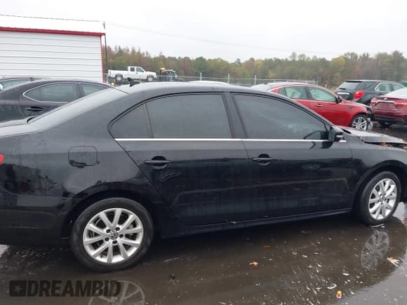 ✅ 2014 Volkswagen Jetta SE • VIN: 3VWD17AJ8EM400226 • Lot: 43564543. Wystawiony na IAAI z przebiegiem 194 106 mil. Bezpłatny archiwum sprzedaży aukcyjnych z USA i szczegółowy raport historii pojazdu na DreamBid. Zdjęcie 13.