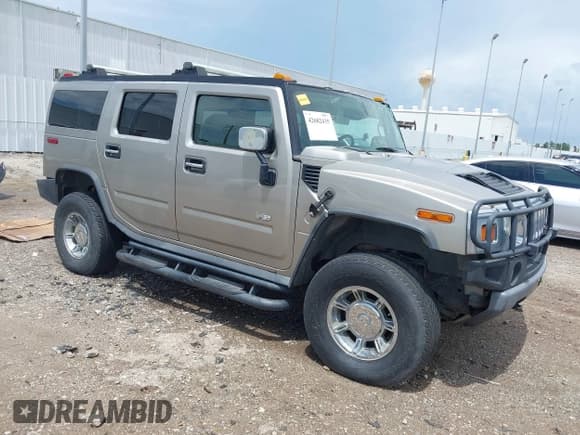 ✅ 2003 Hummer H2 • VIN: 5GRGN23U83H123964 • Лот: 42682435. Опубликован ранее на IAAI с пробегом 137 171 миль. Бесплатный доступ к архиву аукционных продаж из США и подробный отчёт об истории автомобиля на DreamBid. Изображение 1.