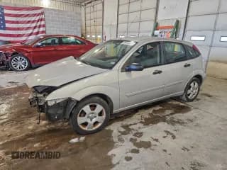 ✅ 2005 Ford Focus S • VIN: 3FAFP37N25R137107 • Lot: 96413025. Listed on Copart with 141,335 mi. Free auction sales archive from the USA and detailed vehicle history report at DreamBid. Image 1.