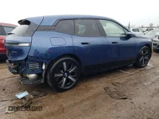 ✅ 2023 BMW iX xDrive50 • VIN: WB523CF04PCM84946 • Лот: 47995414. Опубликован ранее на Copart с пробегом 6 037 миль. Бесплатный доступ к архиву аукционных продаж из США и подробный отчёт об истории автомобиля на DreamBid. Изображение 3.