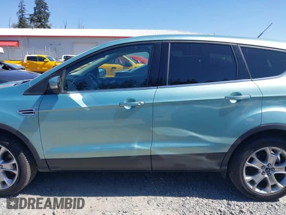 ✅ 2013 Ford Escape SEL • VIN: 1FMCU9H99DUC55653 • Lot: 42002872. Wystawiony na IAAI z przebiegiem 84 776 mil. Bezpłatny archiwum sprzedaży aukcyjnych z USA i szczegółowy raport historii pojazdu na DreamBid. Zdjęcie 15.