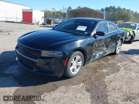 ✅ 2022 Dodge Charger SXT • VIN: 2C3CDXBG0NH207726 • Lot: 43459715. Listed on IAAI with 83,619 mi. Free auction sales archive from the USA and detailed vehicle history report at DreamBid. Image 17.