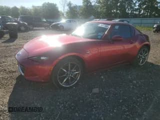 ✅ 2021 Mazda MX-5 Miata Grand Touring • VIN: JM1NDAM73M0459746 • Lot: 71677105. Wystawiony na Copart z przebiegiem 20 365 mil. Bezpłatny archiwum sprzedaży aukcyjnych z USA i szczegółowy raport historii pojazdu na DreamBid. Zdjęcie 1.