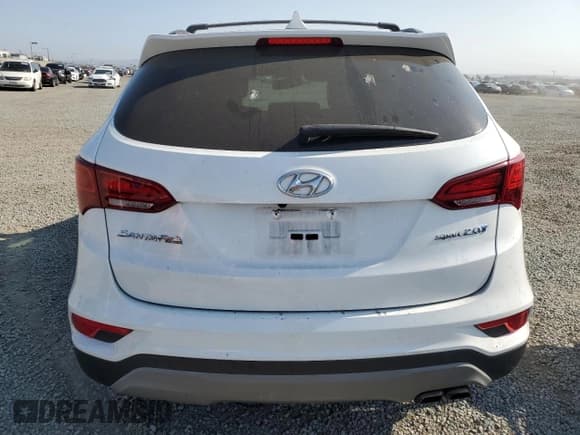 ✅ 2018 Hyundai Santa Fe 2.0T • VIN: 5XYZU4LA0JG554836 • Лот: 65013984. Опубликован ранее на Copart с пробегом 102 398 миль. Бесплатный доступ к архиву аукционных продаж из США и подробный отчёт об истории автомобиля на DreamBid. Изображение 6.