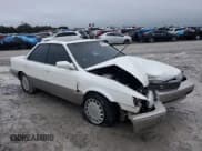 ✅ 1990 Lexus ES 250 • VIN: JT8VV22TXL0127853 • Lot: 89850475. Wystawiony na Copart z przebiegiem 118 211 mil. Bezpłatny archiwum sprzedaży aukcyjnych z USA i szczegółowy raport historii pojazdu na DreamBid. Zdjęcie 4.