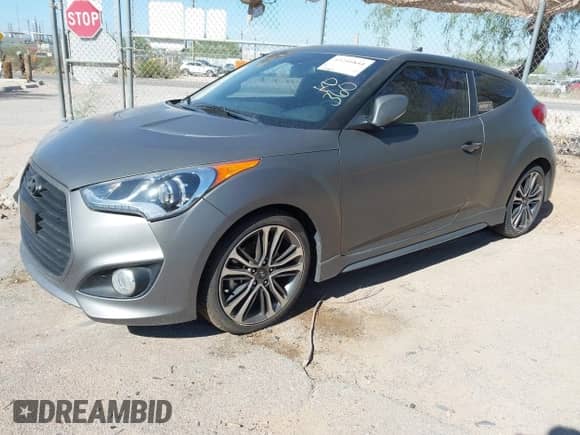 2014 Hyundai Veloster Turbo с VIN KMHTC6AE0EU184269, выставлен на аукционе IAAI как лот 43241844 с пробегом 60 668 миль миль и . История ставок и продаж доступна на DreamBid. Изображение 2.