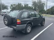 ✅ 1999 Isuzu Rodeo S • VIN: 4S2CK58W7X4357230 • Lot: 45724855. Listed on Copart with 130,446 mi. Free auction sales archive from the USA and detailed vehicle history report at DreamBid. Image 4.