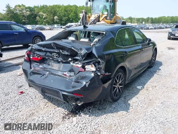 2023 Toyota Camry SE z VIN 4T1G11BKXPU101092, wystawiony jako IAAI lot #42396141 z przebiegiem 22 174 mil mil oraz . Historia ofert i sprzedaży dostępna na DreamBid. Obrazek 6.