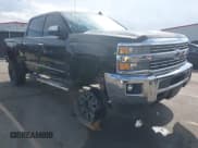 ✅ 2015 Chevrolet Silverado 2500HD LTZ • VIN: 1GC1KWE84FF609940 • Lot: 43407719. Listed on IAAI with 165,422 mi. Free auction sales archive from the USA and detailed vehicle history report at DreamBid. Image 1.