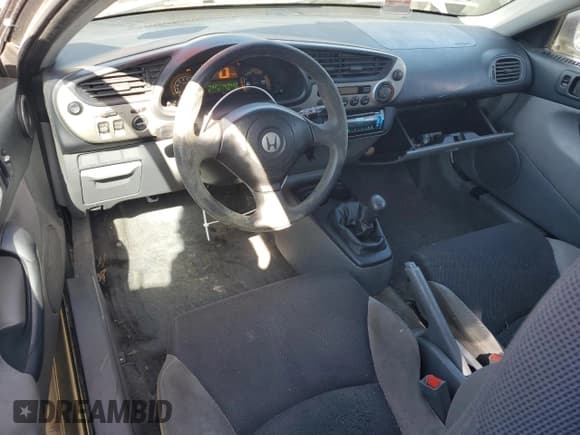 ✅ 2000 Honda Insight • VIN: JHMZE1355YT002857 • Lot: 51543705. Listed on Copart with 169,522 mi. Free auction sales archive from the USA and detailed vehicle history report at DreamBid. Image 8.