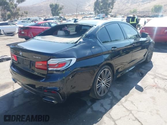 ✅ 2019 BMW 5 Series 540i • VIN: WBAJE5C58KWW28427 • Lot: 42853012. Listed on IAAI with 97,214 mi. Free auction sales archive from the USA and detailed vehicle history report at DreamBid. Image 4.