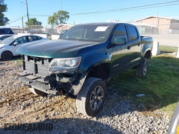 2015 Chevrolet Colorado 4WD Z71 with VIN 1GCGTCE33F1195993, listed as a IAAI auction lot 43435964 with 225,869 mi miles and . Bid and sale history available at DreamBid. Image 2.