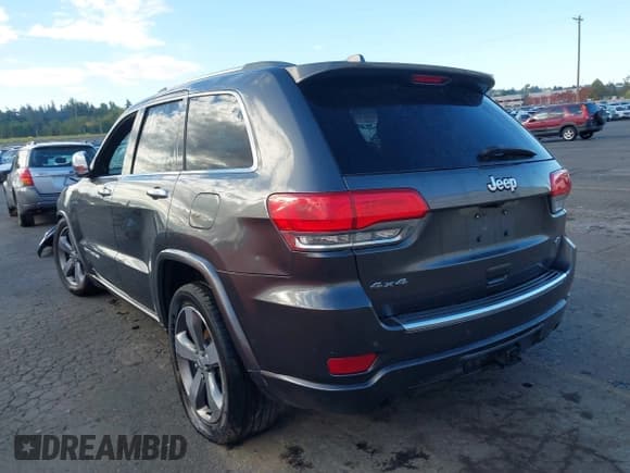 ✅ 2015 Jeep Grand Cherokee Overland • VIN: 1C4RJFCG3FC697994 • Lot: 40526924. Listed on IAAI with 199,275 mi. Free auction sales archive from the USA and detailed vehicle history report at DreamBid. Image 3.