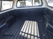 ✅ 2011 Toyota Tacoma • VIN: 5TFPX4EN9BX001390 • Lot: 43605165. Listed on IAAI with 125,923 mi. Free auction sales archive from the USA and detailed vehicle history report at DreamBid. Image 8.