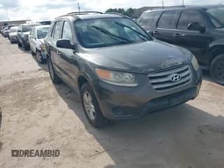 ✅ 2012 Hyundai Santa Fe GLS • VIN: 5XYZG3AB5CG121853 • Lot: 42968225. Listed on IAAI with 196,302 mi. Free auction sales archive from the USA and detailed vehicle history report at DreamBid. Image 1.