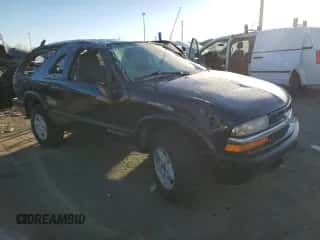 ✅ 2000 Chevrolet Blazer LS • VIN: 1GNCT18W7YK143649 • Lot: 87656195. Wystawiony na Copart z przebiegiem Nie podano. Bezpłatny archiwum sprzedaży aukcyjnych z USA i szczegółowy raport historii pojazdu na DreamBid. Zdjęcie 4.