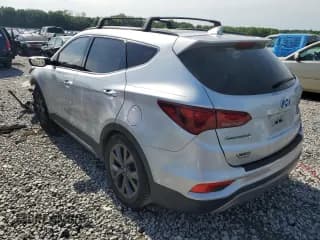 ✅ 2018 Hyundai Santa Fe Ultimate • VIN: 5XYZW4LAXJG504066 • Лот: 54179224. Опубликован ранее на Copart с пробегом 66 662 миль. Бесплатный доступ к архиву аукционных продаж из США и подробный отчёт об истории автомобиля на DreamBid. Изображение 2.