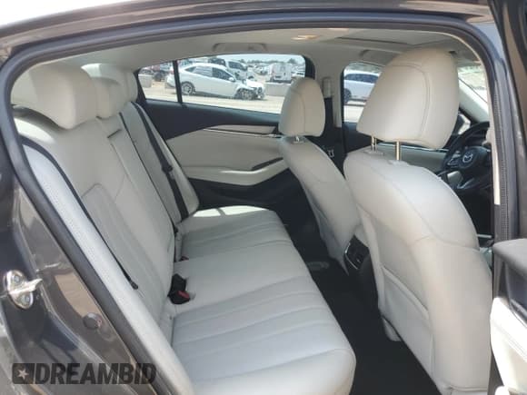 ✅ 2019 Mazda 6 Grand Touring Reserve • VIN: JM1GL1WY6K1501562 • Лот: 65898284. Опубликован ранее на Copart с пробегом 44 466 миль. Бесплатный доступ к архиву аукционных продаж из США и подробный отчёт об истории автомобиля на DreamBid. Изображение 10.