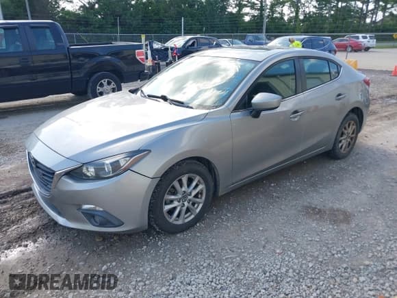 ✅ 2015 Mazda 3 i Touring • VIN: 3MZBM1V74FM144856 • Lot: 42570180. Listed on IAAI with 132,573 mi. Free auction sales archive from the USA and detailed vehicle history report at DreamBid. Image 2.