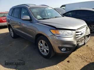 2012 Hyundai Santa Fe Limited с VIN 5XYZKDAG5CG110772, выставлен на аукционе Copart как лот 71411764 с пробегом 218 606 миль миль и Списание • Salvage title. История ставок и продаж доступна на DreamBid. Изображение 4.