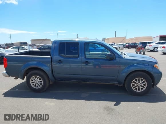 ✅ 2014 Nissan Frontier SV • VIN: 1N6AD0ER2EN767100 • Lot: 43213268. Listed on IAAI with 116,153 mi. Free auction sales archive from the USA and detailed vehicle history report at DreamBid. Image 13.