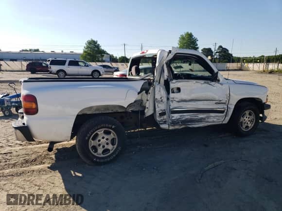 2002 Chevrolet Silverado 1500 LS with VIN 1GCEC14V72Z341127, listed as a Copart auction lot 56264674 with 306,494 mi miles and Salvage title. Bid and sale history available at DreamBid. Image 3.