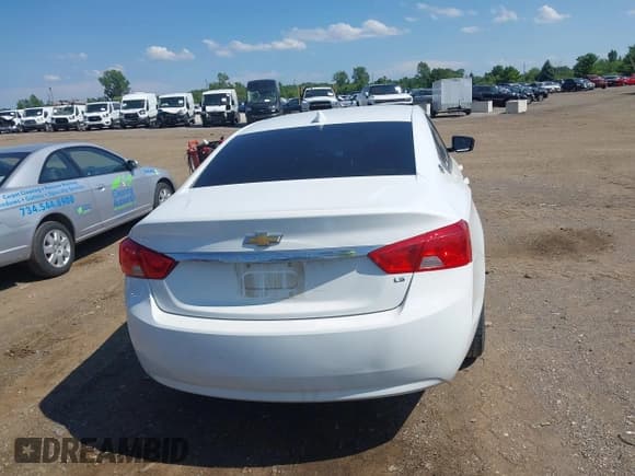 ✅ 2016 Chevrolet Impala LS • VIN: 2G11X5SA2G9187852 • Lot: 42711764. Listed on IAAI with 141,815 mi. Free auction sales archive from the USA and detailed vehicle history report at DreamBid. Image 16.