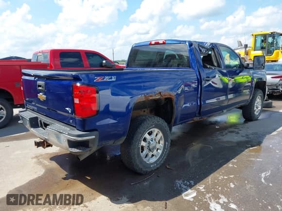 ✅ 2015 Chevrolet Silverado 2500HD LT • VIN: 1GC1KVEG4FF107284 • Lot: 42907719. Listed on IAAI with 313,421 mi. Free auction sales archive from the USA and detailed vehicle history report at DreamBid. Image 4.