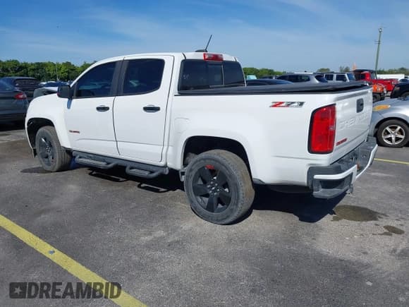 ✅ 2021 Chevrolet Colorado 2WD LT • VIN: 1GCGSCEN3M1276560 • Lot: 41442039. Listed on IAAI with 82,538 mi. Free auction sales archive from the USA and detailed vehicle history report at DreamBid. Image 3.
