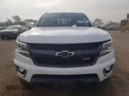 ✅ 2018 Chevrolet Colorado 4WD Z71 • VIN: 1GCGTDEN7J1306447 • Лот: 67300665. Опубликован ранее на Copart с пробегом 193 687 миль. Бесплатный доступ к архиву аукционных продаж из США и подробный отчёт об истории автомобиля на DreamBid. Изображение 5.