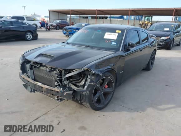 2009 Dodge Charger SRT-8 с VIN 2B3LA73W29H568764, выставлен на аукционе IAAI как лот 41869358 с пробегом 96 029 миль миль и . История ставок и продаж доступна на DreamBid. Изображение 2.