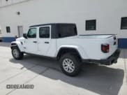✅ 2023 Jeep Gladiator Sport S • VIN: 1C6HJTAG9PL582791 • Lot: 63684225. Listed on Copart with 21,958 mi. Free auction sales archive from the USA and detailed vehicle history report at DreamBid. Image 2.