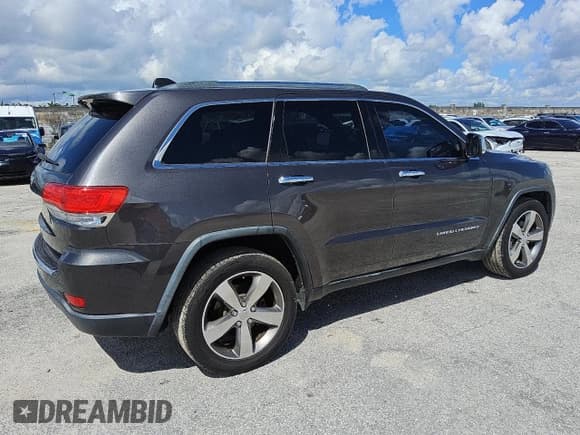 ✅ 2015 Jeep Grand Cherokee Limited • VIN: 1C4RJEBG6FC906320 • Lot: 81384665. Listed on Copart with 140,796 mi. Free auction sales archive from the USA and detailed vehicle history report at DreamBid. Image 3.