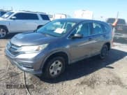 ✅ 2016 Honda CR-V LX • VIN: 3CZRM3H39GG704869 • Lot: 43588432. Listed on IAAI with 105,234 mi. Free auction sales archive from the USA and detailed vehicle history report at DreamBid. Image 2.