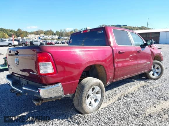 2021 Ram 1500 Lone Star with VIN 1C6SRFFT8MN520787, listed as a IAAI auction lot 43470670 with 56,099 mi miles and . Bid and sale history available at DreamBid. Image 4.