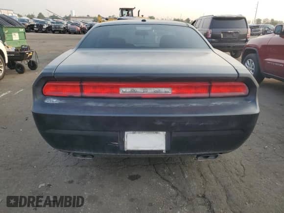 2013 Dodge Challenger SXT z VIN 2C3CDYAG8DH530525, wystawiony jako Copart lot #64064784 z przebiegiem 87 118 mil mil oraz Szkoda całkowita • Salvage title. Historia ofert i sprzedaży dostępna na DreamBid. Obrazek 6.