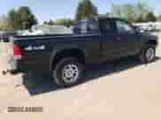 2003 Dodge Dakota Sport z VIN 1D7HG32N63S164313, wystawiony jako Copart lot #54088715 z przebiegiem 280 998 mil mil oraz Szkoda całkowita • Salvage title. Historia ofert i sprzedaży dostępna na DreamBid. Obrazek 3.