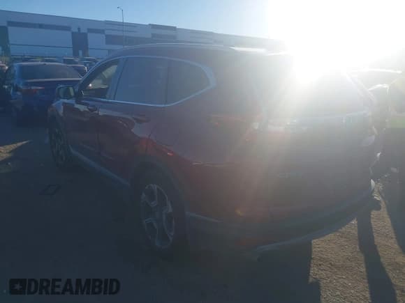 ✅ 2019 Honda CR-V Touring • VIN: 2HKRW1H94KH502563 • Lot: 43573536. Listed on IAAI with 42,050 mi. Free auction sales archive from the USA and detailed vehicle history report at DreamBid. Image 3.