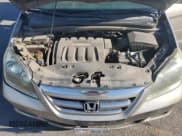 ✅ 2005 Honda Odyssey EX-L • VIN: 5FNRL38705B097212 • Лот: 92655085. Опубликован ранее на Copart с пробегом 162 776 миль. Бесплатный доступ к архиву аукционных продаж из США и подробный отчёт об истории автомобиля на DreamBid. Изображение 12.