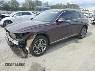 ✅ 2022 Genesis GV70 2.5T • VIN: KMUMADTBXNU044538 • Лот: 85105605. Опубликован ранее на Copart с пробегом 65 781 миль. Бесплатный доступ к архиву аукционных продаж из США и подробный отчёт об истории автомобиля на DreamBid. Изображение 1.