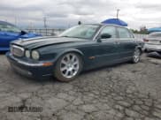 ✅ 2005 Jaguar XJ 8 LWB • VIN: SAJWA79C65SG34572 • Лот: 93790045. Опубликован ранее на Copart с пробегом 148 958 миль. Бесплатный доступ к архиву аукционных продаж из США и подробный отчёт об истории автомобиля на DreamBid. Изображение 1.