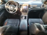 ✅ 2014 Jeep Grand Cherokee Overland • VIN: 1C4RJFCG4EC329399 • Lot: 87310795. Listed on Copart with 188,640 mi. Free auction sales archive from the USA and detailed vehicle history report at DreamBid. Image 8.